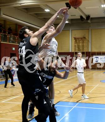 Basketball 2. Liga 2022/2023. Grunddurchgang 13. Runde.  KOS Celovec gegen  Guessing Blackbirds.  Andrej Blazevic  (KOS),  Christoph Astl , Florian Poecksteiner (Guessing). Klagenfurt, am 21.1.2023.
Foto: Kuess
www.qspictures.net
---
pressefotos, pressefotografie, kuess, qs, qspictures, sport, bild, bilder, bilddatenbank