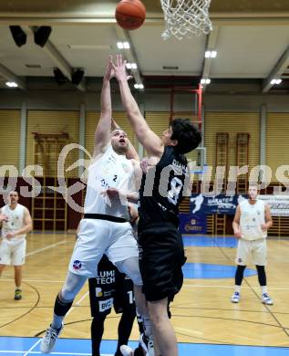 Basketball 2. Liga 2022/2023. Grunddurchgang 13. Runde.  KOS Celovec gegen  Guessing Blackbirds.  Tim Huber  (KOS),  Bernhard Koch (Guessing). Klagenfurt, am 21.1.2023.
Foto: Kuess
www.qspictures.net
---
pressefotos, pressefotografie, kuess, qs, qspictures, sport, bild, bilder, bilddatenbank