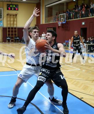 Basketball 2. Liga 2022/2023. Grunddurchgang 13. Runde.  KOS Celovec gegen  Guessing Blackbirds.  Andrej Blazevic  (KOS),  Christoph Astl  (Guessing). Klagenfurt, am 21.1.2023.
Foto: Kuess
www.qspictures.net
---
pressefotos, pressefotografie, kuess, qs, qspictures, sport, bild, bilder, bilddatenbank