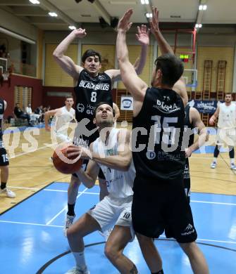 Basketball 2. Liga 2022/2023. Grunddurchgang 13. Runde.  KOS Celovec gegen  Guessing Blackbirds.   Dalibor Cevriz (KOS),   Bernhard Koch (Guessing). Klagenfurt, am 21.1.2023.
Foto: Kuess
www.qspictures.net
---
pressefotos, pressefotografie, kuess, qs, qspictures, sport, bild, bilder, bilddatenbank