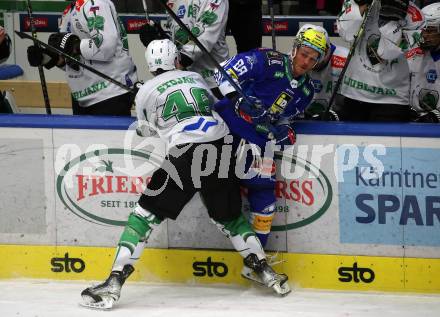 EBEL. Eishockey Bundesliga. EC VSV gegen HK SZ Olimpija Ljubljana.  Anthony Luciani,    (VSV),  Nejc Stojan  (Ljubljana). Villach, am 22.1.2023
Foto: Kuess
www.qspictures.net
---
pressefotos, pressefotografie, kuess, qs, qspictures, sport, bild, bilder, bilddatenbank