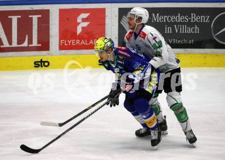 EBEL. Eishockey Bundesliga. EC VSV gegen HK SZ Olimpija Ljubljana.   Nicolas Rivett-Mattinen,  (VSV),    Jaka Sturm  (Ljubljana). Villach, am 22.1.2023
Foto: Kuess
www.qspictures.net
---
pressefotos, pressefotografie, kuess, qs, qspictures, sport, bild, bilder, bilddatenbank