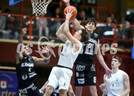 Basketball 2. Liga 2022/2023. Grunddurchgang 13. Runde.  KOS Celovec gegen  Guessing Blackbirds.   Niklas Michel (KOS),  Bernhard Koch  (Guessing). Klagenfurt, am 21.1.2023.
Foto: Kuess
www.qspictures.net
---
pressefotos, pressefotografie, kuess, qs, qspictures, sport, bild, bilder, bilddatenbank