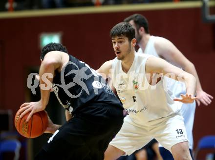 Basketball 2. Liga 2022/2023. Grunddurchgang 13. Runde.  KOS Celovec gegen  Guessing Blackbirds. Maximilian Seher  (KOS),   Christoph Astl  (Guessing). Klagenfurt, am 21.1.2023.
Foto: Kuess
www.qspictures.net
---
pressefotos, pressefotografie, kuess, qs, qspictures, sport, bild, bilder, bilddatenbank