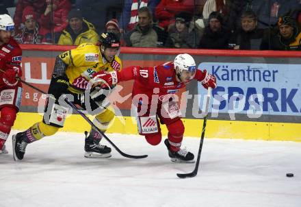 EBEL. Eishockey Bundesliga. EC KAC gegen  spusu Vienna Capitals.    Thomas Vallant, (KAC),    James Sheppard  (Vienna Capitals). Klagenfurt, am 27.1.2023.
Foto: Kuess
www.qspictures.net
---
pressefotos, pressefotografie, kuess, qs, qspictures, sport, bild, bilder, bilddatenbank