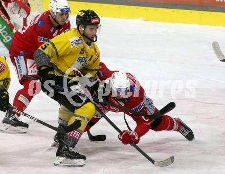 EBEL. Eishockey Bundesliga. EC KAC gegen  spusu Vienna Capitals.  Lucas Lessio,  (KAC),     James Sheppard (Vienna Capitals). Klagenfurt, am 27.1.2023.
Foto: Kuess
www.qspictures.net
---
pressefotos, pressefotografie, kuess, qs, qspictures, sport, bild, bilder, bilddatenbank