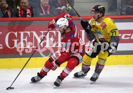 EBEL. Eishockey Bundesliga. EC KAC gegen  spusu Vienna Capitals.   Steven Strong,   (KAC),    Matt Bradley (Vienna Capitals). Klagenfurt, am 27.1.2023.
Foto: Kuess
www.qspictures.net
---
pressefotos, pressefotografie, kuess, qs, qspictures, sport, bild, bilder, bilddatenbank