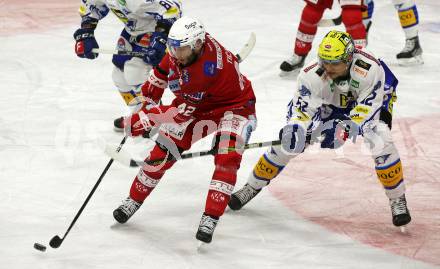 EBEL. Eishockey Bundesliga. EC KAC gegen VSV.    Rok Ticar, (KAC),   Nicolas Rivett-Mattinen  (VSV). Klagenfurt, am 29.1.2023.
Foto: Kuess
www.qspictures.net
---
pressefotos, pressefotografie, kuess, qs, qspictures, sport, bild, bilder, bilddatenbank