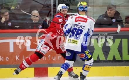 EBEL. Eishockey Bundesliga. EC KAC gegen VSV.    David Maier,  (KAC),   Blaz Tomazevic (VSV). Klagenfurt, am 29.1.2023.
Foto: Kuess
www.qspictures.net
---
pressefotos, pressefotografie, kuess, qs, qspictures, sport, bild, bilder, bilddatenbank