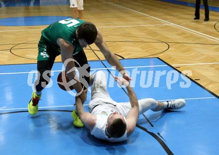 Basketball 2. Liga 2022/2023. Grunddurchgang 15. Runde.  KOS Celovec gegen Dornbirn Lions.   Tim Huber (KOS), Filip Kamenov  (Dornbirn). Klagenfurt, am 4.2.2023.
Foto: Kuess
www.qspictures.net
---
pressefotos, pressefotografie, kuess, qs, qspictures, sport, bild, bilder, bilddatenbank