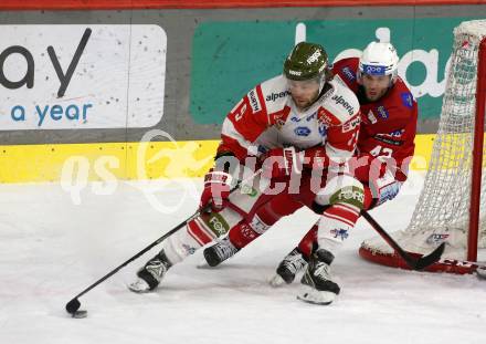 EBEL. Eishockey Bundesliga. EC KAC gegen HCB Suedtirol Alperia.   Rok Ticar, (KAC),     Brad McClure   (Bozen). Klagenfurt, am 17.2.2023.
Foto: Kuess
www.qspictures.net
---
pressefotos, pressefotografie, kuess, qs, qspictures, sport, bild, bilder, bilddatenbank