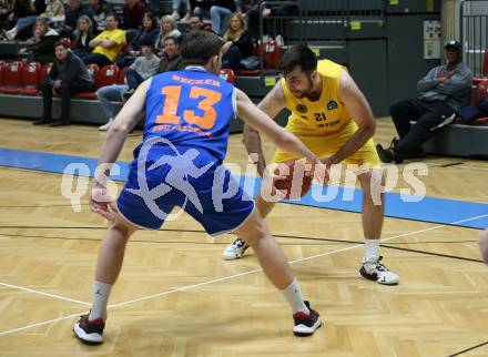 Basketball 2. Liga 2022/2023. Grunddurchgang 17. Runde. Woerthersee Piraten gegen BBU Salzburg.   Marin Sliskovic (Piraten), Robert Becker  (Salzburg). Klagenfurt, am 19.2.2023.
Foto: Kuess
www.qspictures.net
---
pressefotos, pressefotografie, kuess, qs, qspictures, sport, bild, bilder, bilddatenbank