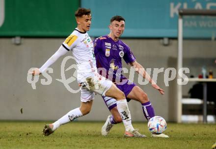 Fussball Bundesliga. SK Austria Klagenfurt gegen RZ Pellets WAC.   Andrew Irving, (Klagenfurt),  Ervin Omic   (WAC). Klagenfurt, am 18.2.2023.
Foto: Kuess
---
pressefotos, pressefotografie, kuess, qs, qspictures, sport, bild, bilder, bilddatenbank