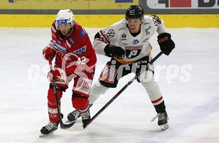 EBEL. Eishockey Bundesliga. EC KAC gegen BEMER Pioneers Vorarlberg.   Rok Ticar,   (KAC),    Luca Erne (Vorarlberg). Klagenfurt, am 21.2.2023.
Foto: Kuess
www.qspictures.net
---
pressefotos, pressefotografie, kuess, qs, qspictures, sport, bild, bilder, bilddatenbank