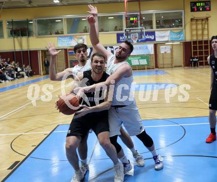 Basketball 2. Liga 2022/2023. Grunddurchgang 18. Runde.  KOS Celovec gegen Woerthersee Piraten. Andi Shehu, Stefan Blazevic (KOS),  Maximilian Kunovjanek (Piraten). Klagenfurt, am 25.2.2023.
Foto: Kuess
www.qspictures.net
---
pressefotos, pressefotografie, kuess, qs, qspictures, sport, bild, bilder, bilddatenbank
