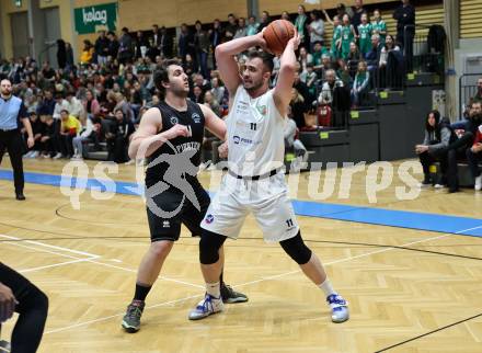 Basketball 2. Liga 2022/2023. Grunddurchgang 18. Runde.  KOS Celovec gegen Woerthersee Piraten.  Andi Shehu (KOS),   Andreas Nuck (Piraten). Klagenfurt, am 25.2.2023.
Foto: Kuess
www.qspictures.net
---
pressefotos, pressefotografie, kuess, qs, qspictures, sport, bild, bilder, bilddatenbank
