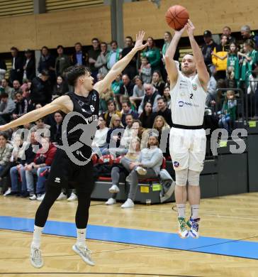Basketball 2. Liga 2022/2023. Grunddurchgang 18. Runde.  KOS Celovec gegen Woerthersee Piraten. Tim Huber (KOS), Felix Leindecker  (Piraten). Klagenfurt, am 25.2.2023.
Foto: Kuess
www.qspictures.net
---
pressefotos, pressefotografie, kuess, qs, qspictures, sport, bild, bilder, bilddatenbank