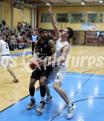 Basketball 2. Liga 2022/2023. Grunddurchgang 18. Runde.  KOS Celovec gegen Woerthersee Piraten.  Andi Smrtnik (KOS), Shawn L. Ray  (Piraten). Klagenfurt, am 25.2.2023.
Foto: Kuess
www.qspictures.net
---
pressefotos, pressefotografie, kuess, qs, qspictures, sport, bild, bilder, bilddatenbank