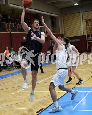 Basketball 2. Liga 2022/2023. Grunddurchgang 18. Runde.  KOS Celovec gegen Woerthersee Piraten.  Stefan Blazevic  (KOS), Maximilian Kunovjanek  (Piraten). Klagenfurt, am 25.2.2023.
Foto: Kuess
www.qspictures.net
---
pressefotos, pressefotografie, kuess, qs, qspictures, sport, bild, bilder, bilddatenbank
