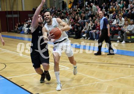 Basketball 2. Liga 2022/2023. Grunddurchgang 18. Runde.  KOS Celovec gegen Woerthersee Piraten. Dalibor Cevriz (KOS), Andreas Nuck  (Piraten). Klagenfurt, am 25.2.2023.
Foto: Kuess
www.qspictures.net
---
pressefotos, pressefotografie, kuess, qs, qspictures, sport, bild, bilder, bilddatenbank