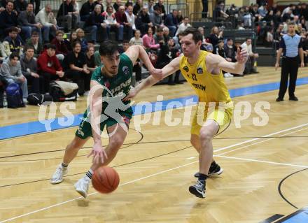 Basketball 2. Liga 2022/2023. Grunddurchgang 19. Runde. Woerthersee Piraten gegen Dornbirn Lions.   Jan-Arne Apschner (Piraten),  Jaksa Sola (Dornbirn). Klagenfurt, am 3.4.2023.
Foto: Kuess
www.qspictures.net
---
pressefotos, pressefotografie, kuess, qs, qspictures, sport, bild, bilder, bilddatenbank