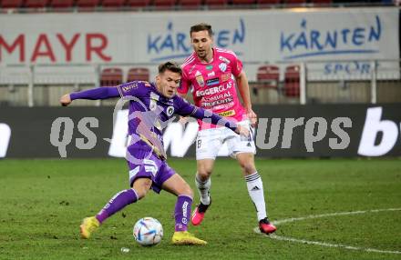 Fussball Bundesliga. SK Austria Klagenfurt gegen TSV Hartberg. Florian Rieder,   (Klagenfurt),    Lukas Fadinger (Hartberg).  Klagenfurt, am 12.3.2023.
Foto: Kuess
---
pressefotos, pressefotografie, kuess, qs, qspictures, sport, bild, bilder, bilddatenbank