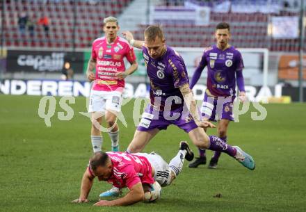 Fussball Bundesliga. SK Austria Klagenfurt gegen TSV Hartberg. Florian Jaritz, (Klagenfurt),    Tobias Kainz   (Hartberg).  Klagenfurt, am 12.3.2023.
Foto: Kuess
---
pressefotos, pressefotografie, kuess, qs, qspictures, sport, bild, bilder, bilddatenbank