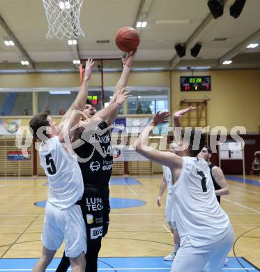 Basketball 2. Liga 2022/2023. Playoff.  2. Runde. KOS Celovec gegen Guessing Blackbirds.   Andi Smrtnik, Stefan Blazevic (KOS), Christoph Astl   (Guessing). Klagenfurt, am 19.3.2023.
Foto: Kuess
www.qspictures.net
---
pressefotos, pressefotografie, kuess, qs, qspictures, sport, bild, bilder, bilddatenbank