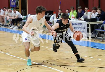 Basketball 2. Liga 2022/2023. Playoff.  2. Runde. KOS Celovec gegen Guessing Blackbirds.   Niklas Michel (KOS),  Tobias Kopcsandy  (Guessing). Klagenfurt, am 19.3.2023.
Foto: Kuess
www.qspictures.net
---
pressefotos, pressefotografie, kuess, qs, qspictures, sport, bild, bilder, bilddatenbank