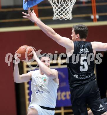 Basketball 2. Liga 2022/2023. Playoff.  2. Runde. KOS Celovec gegen Guessing Blackbirds.   Grega Sajevic (KOS),   Sebastian Koch (Guessing). Klagenfurt, am 19.3.2023.
Foto: Kuess
www.qspictures.net
---
pressefotos, pressefotografie, kuess, qs, qspictures, sport, bild, bilder, bilddatenbank