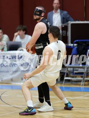 Basketball 2. Liga 2022/2023. Playoff.  2. Runde. KOS Celovec gegen Guessing Blackbirds.   Grega Sajevic (KOS), Noah Hajszan   (Guessing). Klagenfurt, am 19.3.2023.
Foto: Kuess
www.qspictures.net
---
pressefotos, pressefotografie, kuess, qs, qspictures, sport, bild, bilder, bilddatenbank