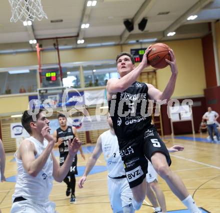 Basketball 2. Liga 2022/2023. Playoff.  2. Runde. KOS Celovec gegen Guessing Blackbirds.   Stefan Blazevic (KOS), Sebastian Koch  (Guessing). Klagenfurt, am 19.3.2023.
Foto: Kuess
www.qspictures.net
---
pressefotos, pressefotografie, kuess, qs, qspictures, sport, bild, bilder, bilddatenbank