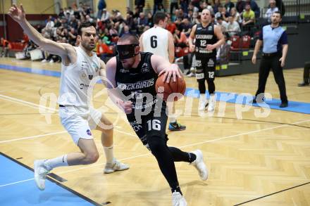 Basketball 2. Liga 2022/2023. Playoff.  2. Runde. KOS Celovec gegen Guessing Blackbirds.   Dalibor Cevriz (KOS),  Noah Hajszan  (Guessing). Klagenfurt, am 19.3.2023.
Foto: Kuess
www.qspictures.net
---
pressefotos, pressefotografie, kuess, qs, qspictures, sport, bild, bilder, bilddatenbank