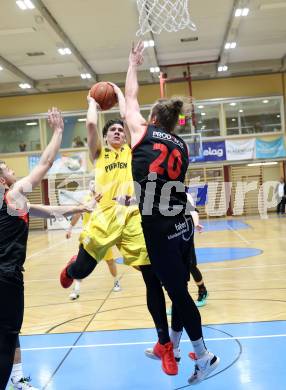 Basketball 2. Liga 2022/2023. Playoff.  2. Runde. Woerthersee Piraten gegen Mistelbach Mustangs.   Nick Cevizovic (Piraten),  Ian Moschik (Mistelbach). Klagenfurt, am 18.3.2023.
Foto: Kuess
www.qspictures.net
---
pressefotos, pressefotografie, kuess, qs, qspictures, sport, bild, bilder, bilddatenbank