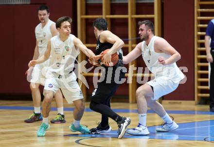 Basketball 2. Liga 2022/2023. Playoff.  2. Runde. KOS Celovec gegen Guessing Blackbirds.   Niklas Michel, Andi Shehu (KOS),  Christoph Astl  (Guessing). Klagenfurt, am 19.3.2023.
Foto: Kuess
www.qspictures.net
---
pressefotos, pressefotografie, kuess, qs, qspictures, sport, bild, bilder, bilddatenbank