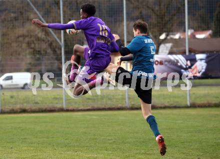 Fussball. Kaerntner Liga. Kraig gegen Austria Klagenfurt Amateure.  Marco Reibnegger  (Kraig),  Mersei Dieu Nsandi  (Klagenfurt). Treibach, 25.3.2023
Foto: Kuess


---
pressefotos, pressefotografie, kuess, qs, qspictures, sport, bild, bilder, bilddatenbank