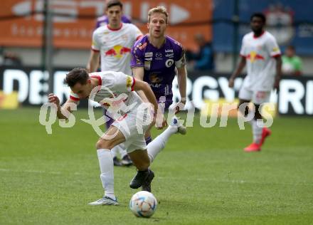 Fussball Bundesliga. SK Austria Klagenfurt gegen Salzburg.  Christopher Cvetko, (Klagenfurt),    Amar Dedic  (Salzburg).  Klagenfurt, am 2.4.2023.
Foto: Kuess
---
pressefotos, pressefotografie, kuess, qs, qspictures, sport, bild, bilder, bilddatenbank