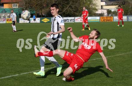 Fussball. Kaerntner Liga. Bleiburg gegen ATSV Wolfsberg.  Mathias Robert Knauder  (Bleiburg),   Philipp Michael Baumgartner (Wolfsberg). Bleiburg 22.4.2023.
Foto: Kuess


---
pressefotos, pressefotografie, kuess, qs, qspictures, sport, bild, bilder, bilddatenbank