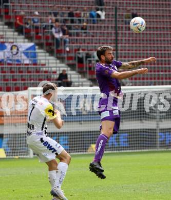 Fussball Bundesliga. SK Austria Klagenfurt gegen LASK.  KOsmas Gkezos, (Klagenfurt), Rene Renner  (LASK). Klagenfurt, am 7.5.2023.
Foto: Kuess
---
pressefotos, pressefotografie, kuess, qs, qspictures, sport, bild, bilder, bilddatenbank