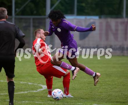 Fussball Kaerntner Liga. KAC gegen Austria Klagenfurt Amat.  Andreas Bernhard Schritliser  (KAC),   Daniel Francis (Austria Klagenfurt). Klagenfurt, 12.5.2023.
Foto: Kuess


---
pressefotos, pressefotografie, kuess, qs, qspictures, sport, bild, bilder, bilddatenbank