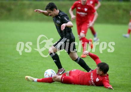 Fussball Kaerntner Liga. Ferlach Atus gegen St. Jakob/Ros.  Christopher Katschnig  (Ferlach),  Marco Koller (St. Jakob). Klagenfurt, 13.5.2023.
Foto: Kuess


---
pressefotos, pressefotografie, kuess, qs, qspictures, sport, bild, bilder, bilddatenbank