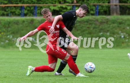 Fussball Kaerntner Liga. Ferlach Atus gegen St. Jakob/Ros.   Marjan Ogris-Martic (Ferlach),    Florian Schaller (St. Jakob). Klagenfurt, 13.5.2023.
Foto: Kuess


---
pressefotos, pressefotografie, kuess, qs, qspictures, sport, bild, bilder, bilddatenbank