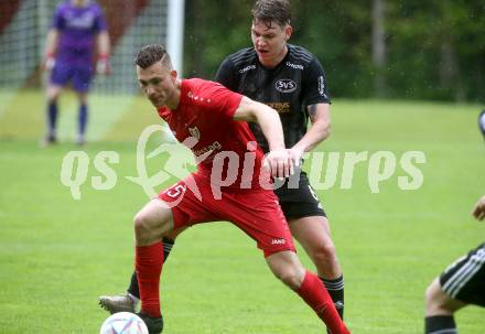 Fussball Kaerntner Liga. Ferlach Atus gegen St. Jakob/Ros.  Martin Posratschnig  (Ferlach),  Florian Schaller  (St. Jakob). Klagenfurt, 13.5.2023.
Foto: Kuess


---
pressefotos, pressefotografie, kuess, qs, qspictures, sport, bild, bilder, bilddatenbank