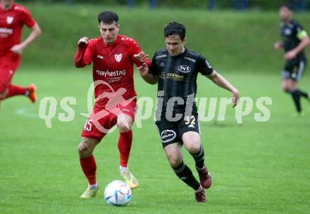 Fussball Kaerntner Liga. Ferlach Atus gegen St. Jakob/Ros.  Christopher Katschnig  (Ferlach),    Marco Koller (St. Jakob). Klagenfurt, 13.5.2023.
Foto: Kuess


---
pressefotos, pressefotografie, kuess, qs, qspictures, sport, bild, bilder, bilddatenbank