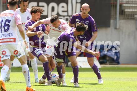 Fussball Bundesliga. SK Austria Klagenfurt gegen FK Austria Wien. Vesel Demaku, Kosmas Gkezos, Nicolas Wimmer (Klagenfurt), Manfred Fischer (Wien).  Klagenfurt, am 21.5.2023.
Foto: Kuess
---
pressefotos, pressefotografie, kuess, qs, qspictures, sport, bild, bilder, bilddatenbank