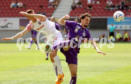 Fussball Bundesliga. SK Austria Klagenfurt gegen FK Austria Wien. Vesel Demaku (Klagenfurt), Doron Leidner (Wien).  Klagenfurt, am 21.5.2023.
Foto: Kuess
---
pressefotos, pressefotografie, kuess, qs, qspictures, sport, bild, bilder, bilddatenbank