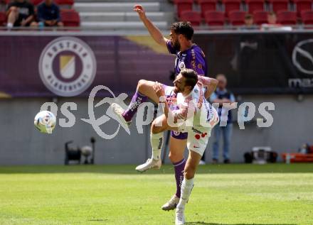 Fussball Bundesliga. SK Austria Klagenfurt gegen FK Austria Wien. Kosmas Gkezos,  (Klagenfurt),  Andreas Gruber   (Wien).  Klagenfurt, am 21.5.2023.
Foto: Kuess
---
pressefotos, pressefotografie, kuess, qs, qspictures, sport, bild, bilder, bilddatenbank