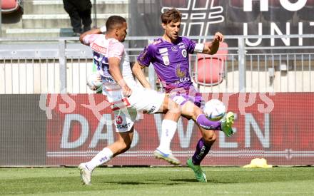 Fussball Bundesliga. SK Austria Klagenfurt gegen FK Austria Wien. Thorsten Mahrer (Klagenfurt), Marvin Martins Santos Da Graca  (Wien).  Klagenfurt, am 21.5.2023.
Foto: Kuess
---
pressefotos, pressefotografie, kuess, qs, qspictures, sport, bild, bilder, bilddatenbank