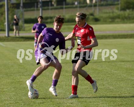 Fussball Kaerntner Liga. SK Austria Klagenfurt gegen Spittal.  Moritz Berg (Austria Klagenfurt), Jonas Oswald (Spittal). Brueckl, am 27.5.2023.
Foto: Kuess



---
pressefotos, pressefotografie, kuess, qs, qspictures, sport, bild, bilder, bilddatenbank