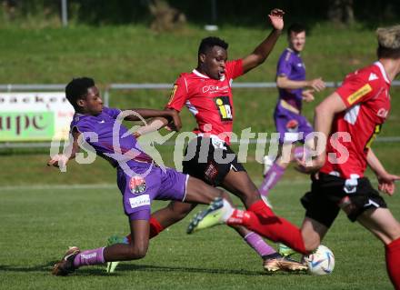 Fussball Kaerntner Liga. SK Austria Klagenfurt gegen Spittal.  Mersei Dieu Nsandi (Austria Klagenfurt), Rashidi Mohamed Udikaluka (Spittal). Brueckl, am 27.5.2023.
Foto: Kuess



---
pressefotos, pressefotografie, kuess, qs, qspictures, sport, bild, bilder, bilddatenbank